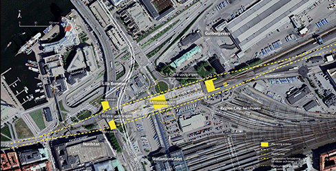 Flygfoto över området kring Station Centralen. Bilden visar stationens läge och placering av plattformar och entréer.